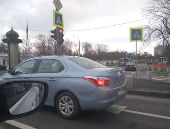 Cars on road in city