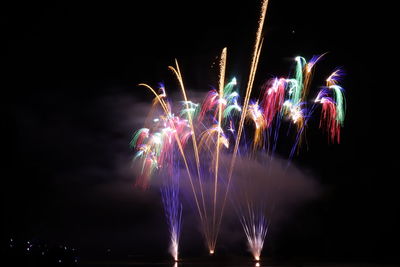 Firework display at night