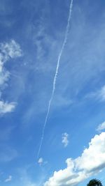 Low angle view of vapor trail in sky