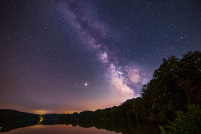 Low angle view of star field against sky at night