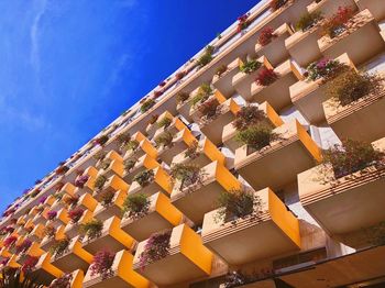 Low angle view of building against blue sky