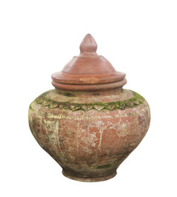 Close-up of old metal structure against white background