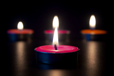 Close-up of illuminated candle