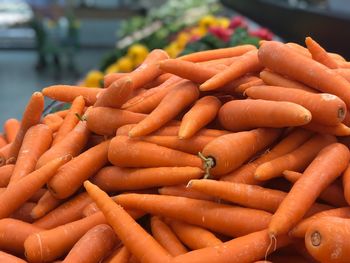 Close-up of carrots for sale at market stall