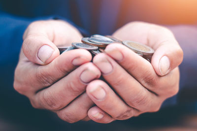 Close-up of hand holding hands