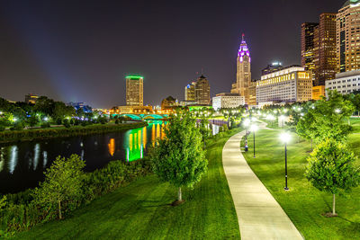 Illuminated city buildings at night