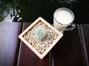 High angle view of coffee cup on table