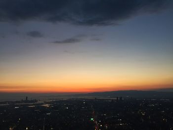 View of cityscape at sunset