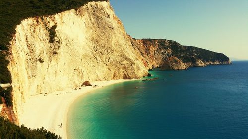 Scenic view of sea against blue sky