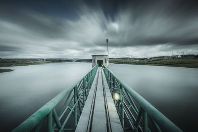 Bridge over water against sky