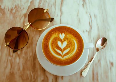 Close-up of coffee cup on table