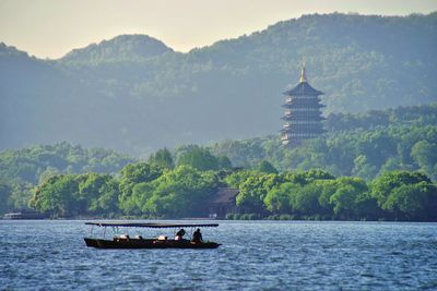 Boat in sea against sky