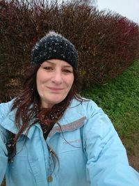 Portrait of smiling young woman