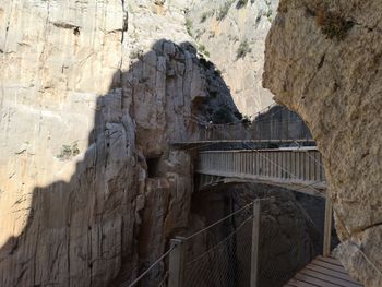 Low angle view of rock formation on bridge