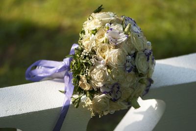 High angle view of bouquet on retaining wall