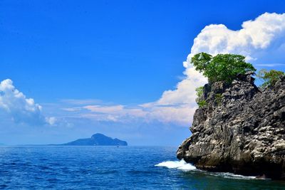 Scenic view of sea against blue sky