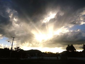 Scenic view of landscape against cloudy sky
