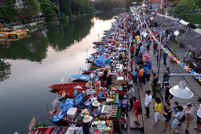 High angle view of people by river