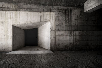 Concrete walls in an abandoned or unfinished architectural space