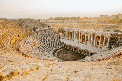 Roman amphitheater in the ruins of hierapolis, in pamukkale, turkey. unesco world heritage in turkey