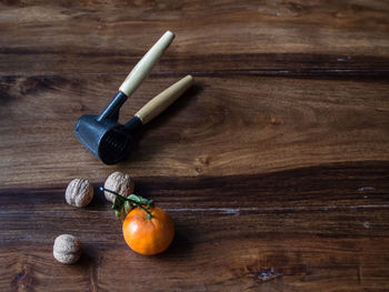 Orange fruit on wooden table