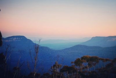 Scenic view of mountains against sky during sunset