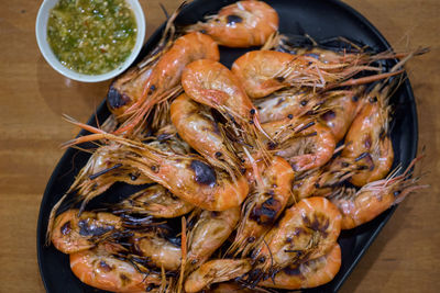 High angle view of fish in bowl on table