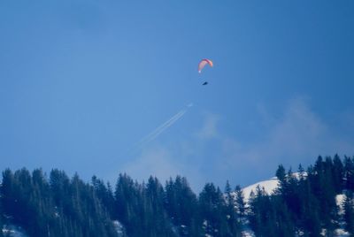 Low angle view of kite flying in sky