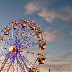 Low angle view of ferris wheel against sky