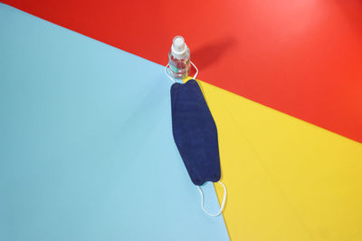 High angle view of umbrella against blue background