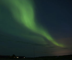 Low angle view of dramatic sky at night