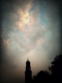 High section of building against cloudy sky