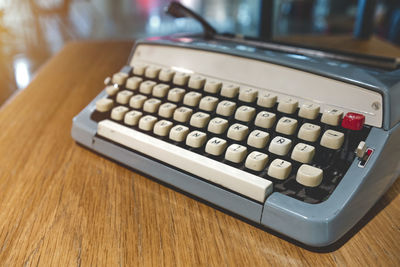 Close-up of typewriter on table