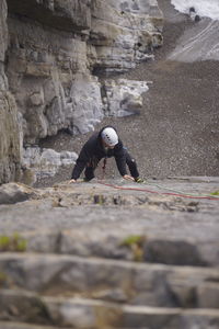 Full length of person on rock