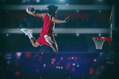 Low angle view of man playing with ball