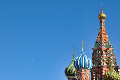 Low angle view of building against blue sky