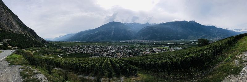 Panoramic view of landscape and mountains against sky