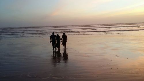 Scenic view of sea at sunset