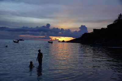 Scenic view of sea at sunset