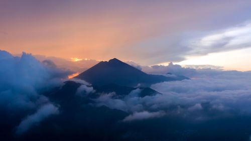 Scenic view of mountains against sky during sunset