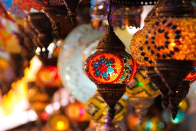 Close-up of illuminated lighting equipment in market