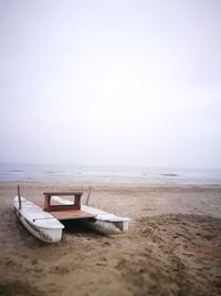 Scenic view of beach against clear sky