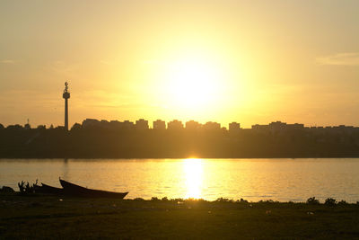 Silhouette of buildings at sunset