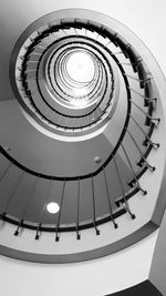 Low angle view of spiral staircase in building