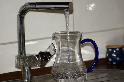 Close-up of drinking glass on table