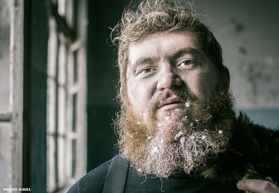 Portrait of man with snow on beard