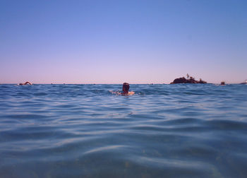 Scenic view of sea against clear sky