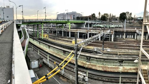 High angle view of train in city against sky