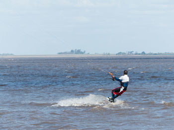 Kitesurfer in beautiful beach