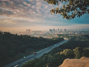 High angle view of road in city against sky